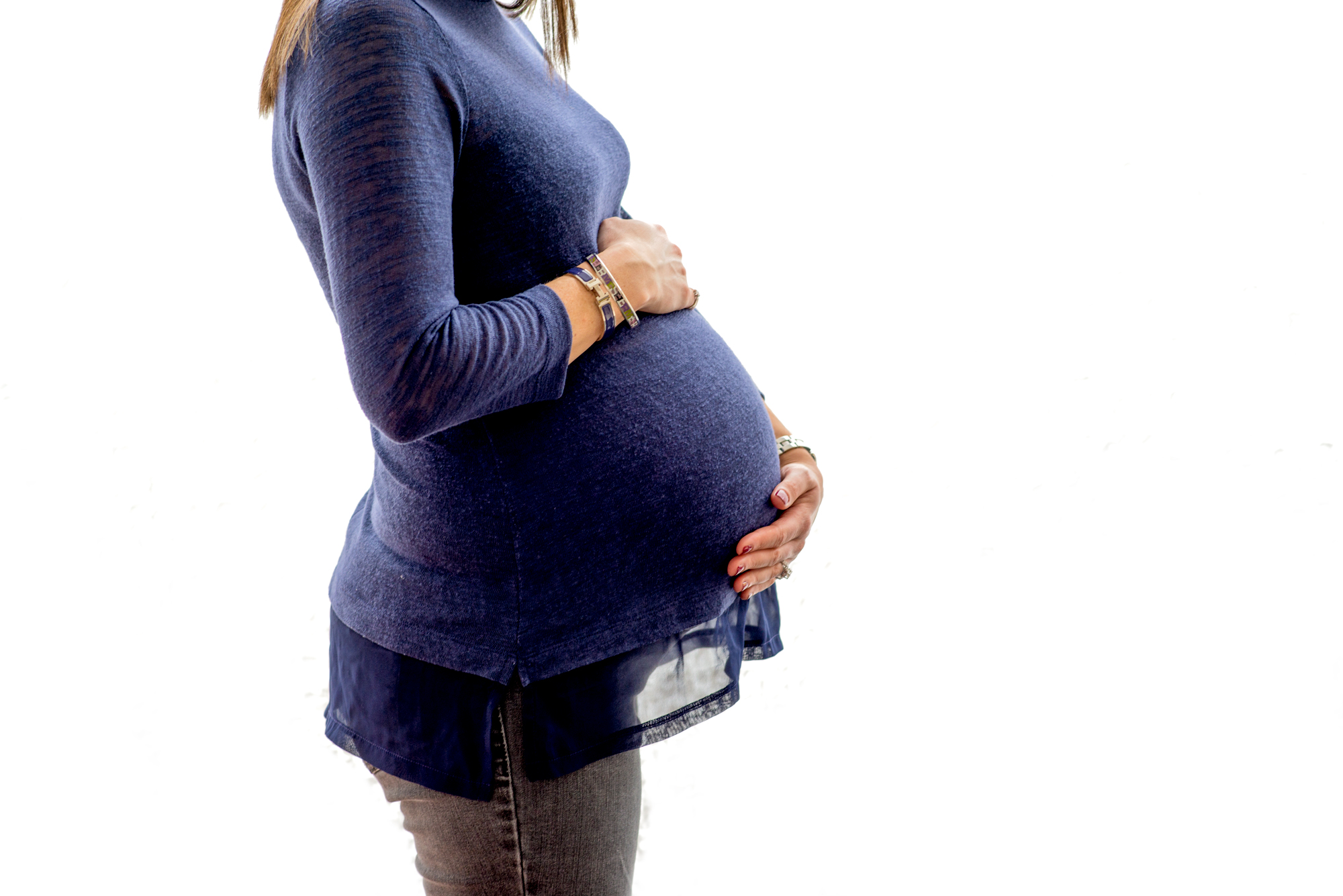 Maternity High key image, blue shirt white background